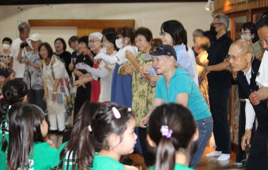 Grandparents and Hilltop students dancing together at Grandparents' Day.
