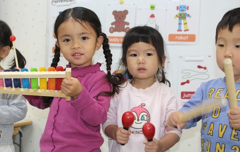 Children playing instruments at Hilltop International School.