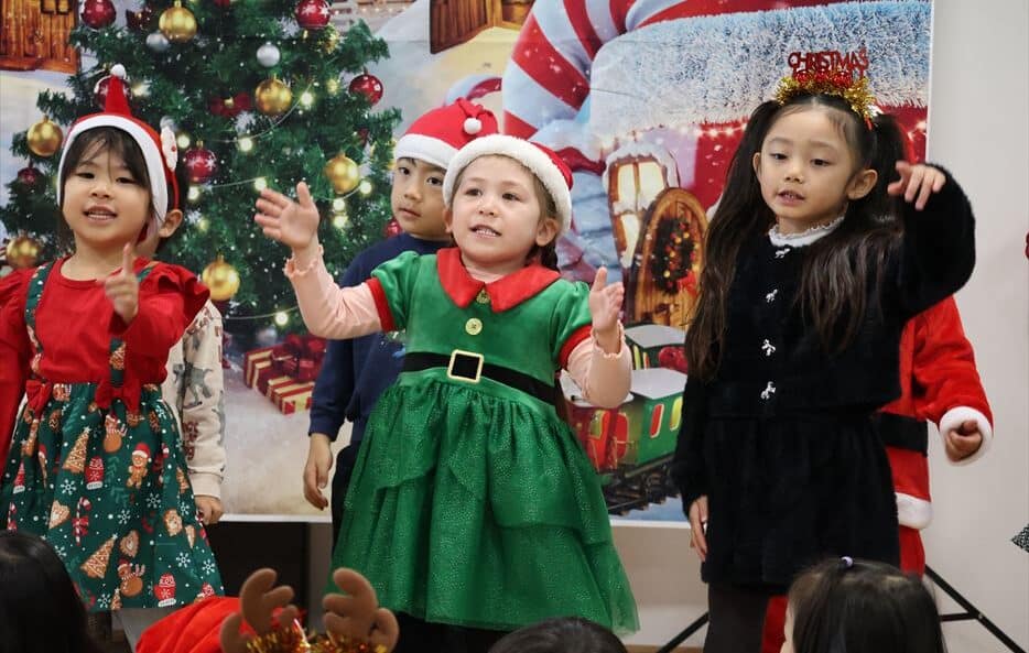 Tiger singing Jamaican Christmas song at Hilltop International School.